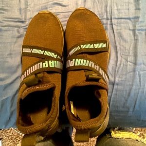 Blue and black Pumas